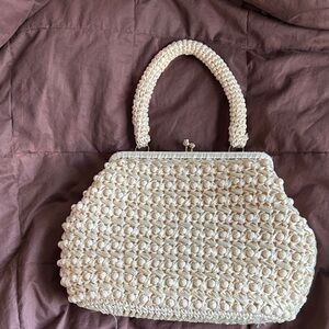 Elegant Cream Woven Handbag